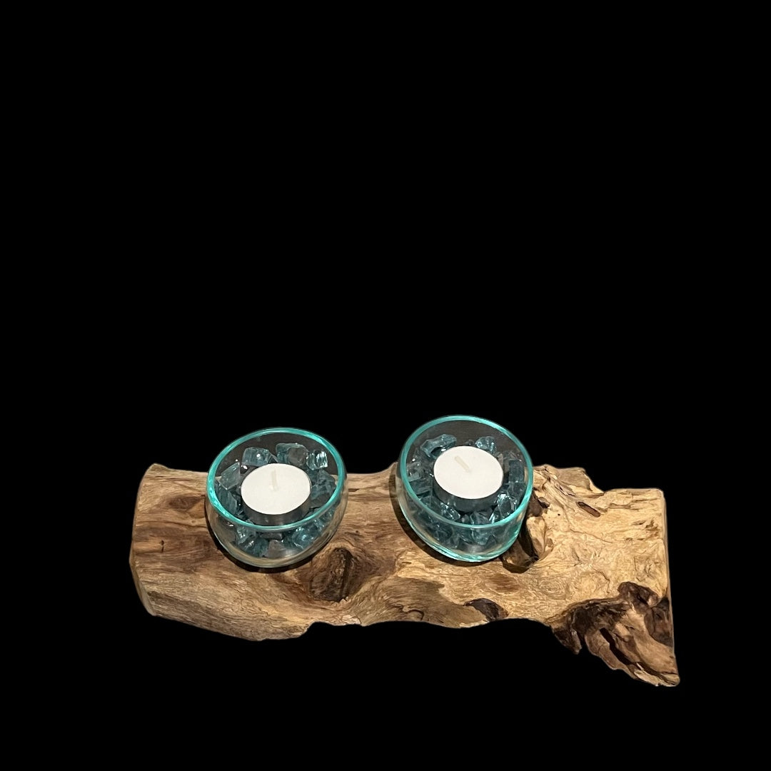 Driftwood Candle Holder with Aqua Colored Fire Glass and Tea Lights. Driftwood Decor on black background.
