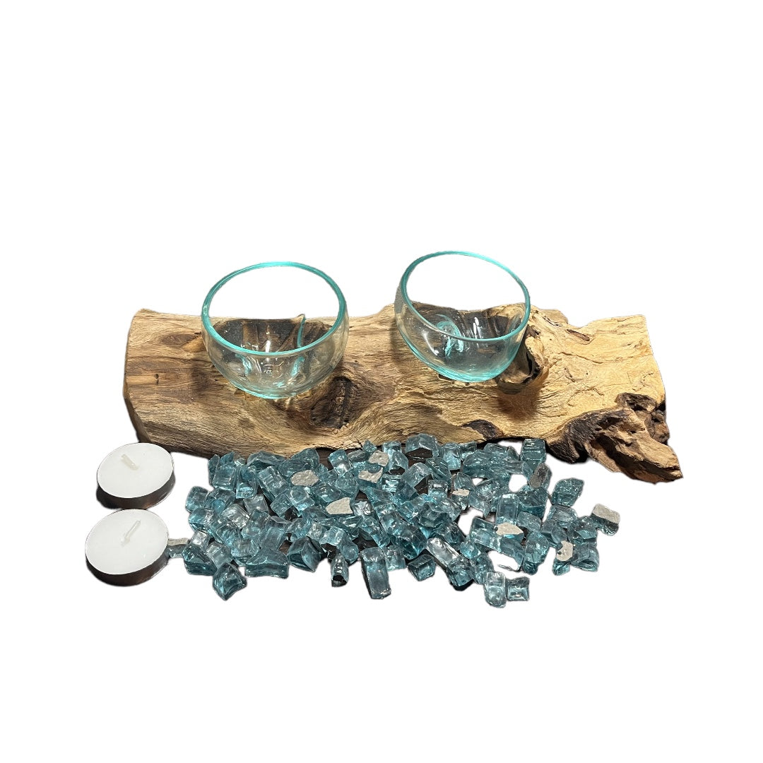Driftwood Candle Holder with Aqua Colored Fire Glass and Tea Lights. Driftwood Decor on white background with aqua colored fire glass and tea lights on table.